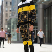 Man wearing a black and yellow patterned outfit on a taken outside