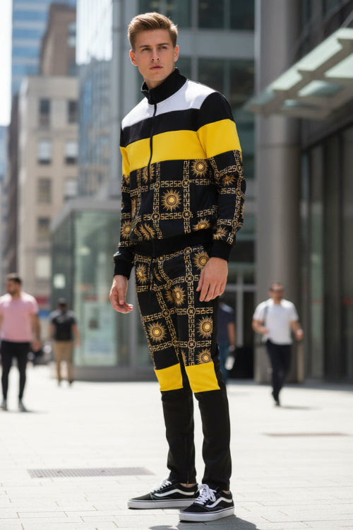 Man wearing a black and yellow patterned outfit on a taken outside