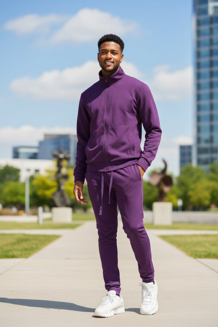 Man wearing a purple tracksuit  taken outide