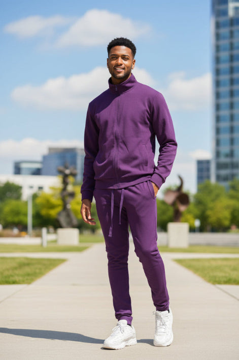 Man wearing a purple tracksuit  taken outide