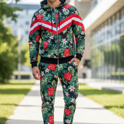 Person wearing a black hoodie with colorful tropical leaf pattern  tken outside