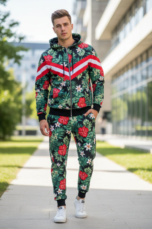 Person wearing a black hoodie with colorful tropical leaf pattern  tken outside