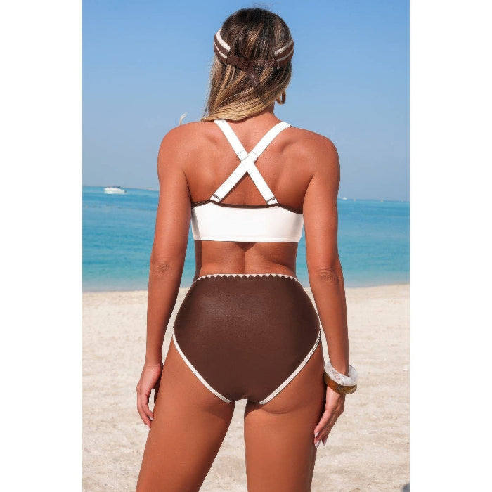 Woman wearing a brown and white bikini on a beach
