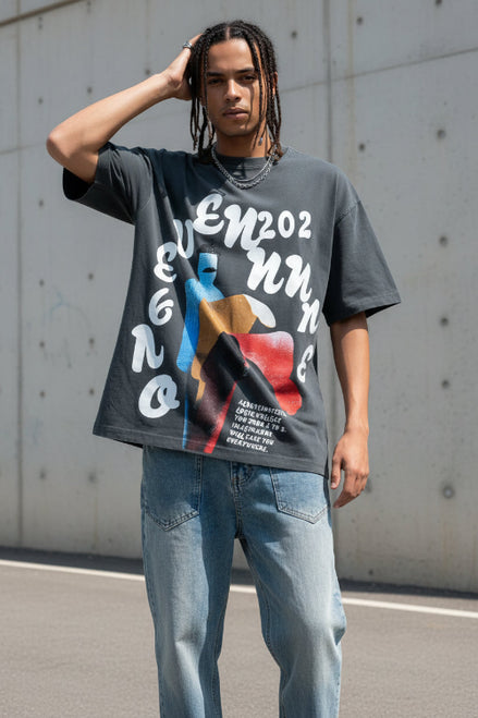 Person wearing a black t-shirt with graphic design and text