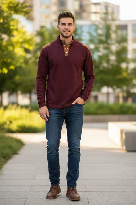 Black long-sleeve shirt with brown shoulder accents on a white background