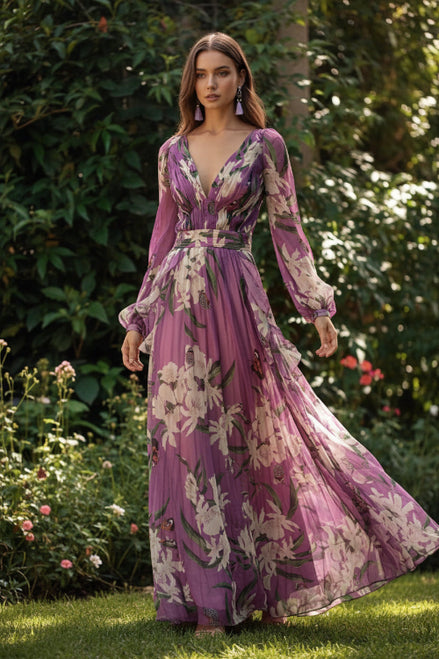 Woman wearing a purple floral dress with a blurred green background