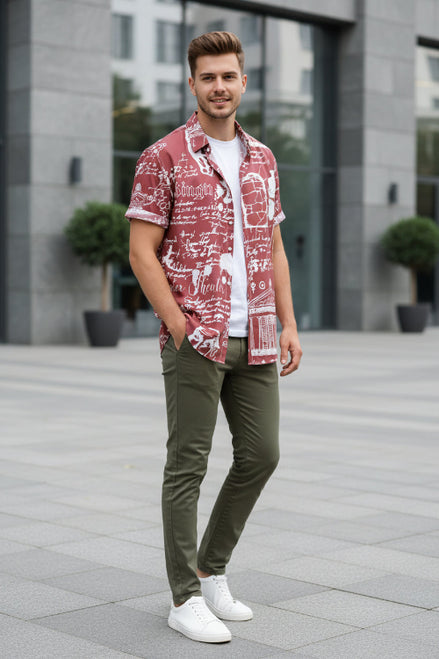 Red patterned shirt on a hanger against a white background