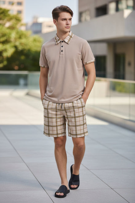 Beige polo shirt and plaid shorts set on a white background