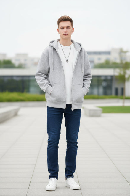 Gray hoodie worn by a person on a light gray background
