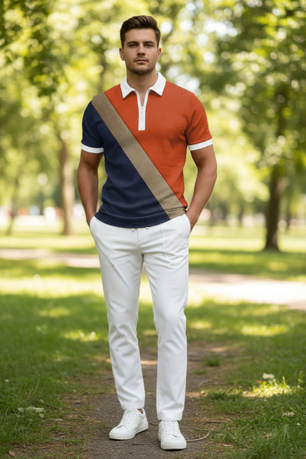 Color-blocked polo shirt with orange, navy, and brown design on a person against a brown background