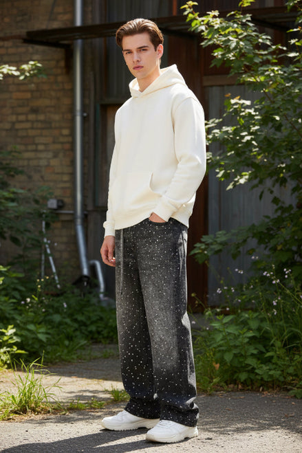 Black jeans with star patterns on a white background