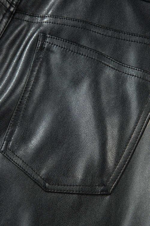 Close-up of a black leather pocket