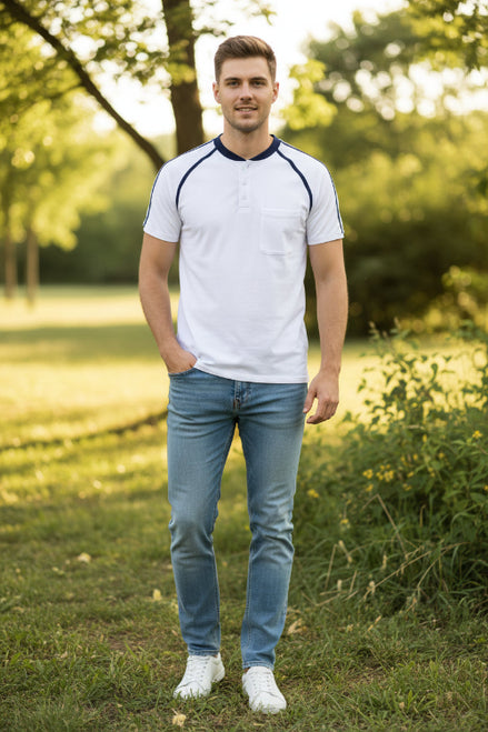 White polo shirt with navy accents on a white background