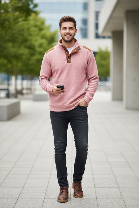 Pink long-sleeve shirt with brown accents on a white background