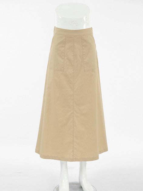 Beige skirt on a mannequin against a white background