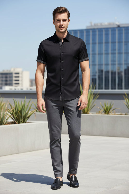 Black short-sleeve shirt with patterned trim on a white background