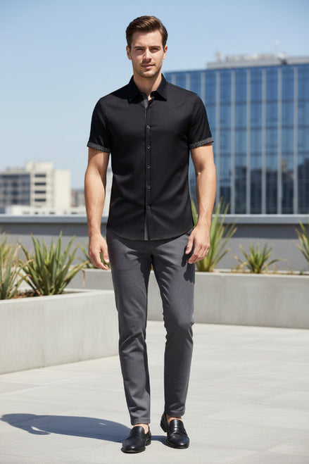Black short-sleeve shirt with patterned trim on a white background