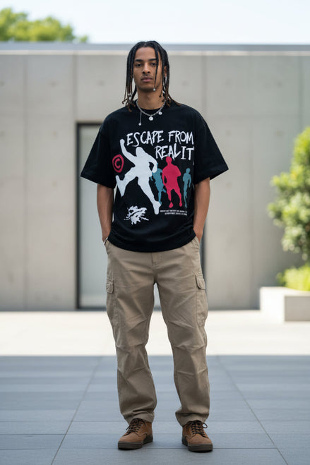 Person wearing a black t-shirt with 'Escape from Reality' graphic design.