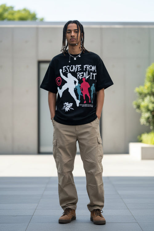 Person wearing a black t-shirt with 'Escape from Reality' graphic design.