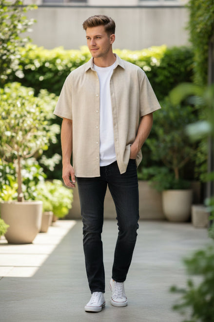Beige corduroy shirt on a white background
