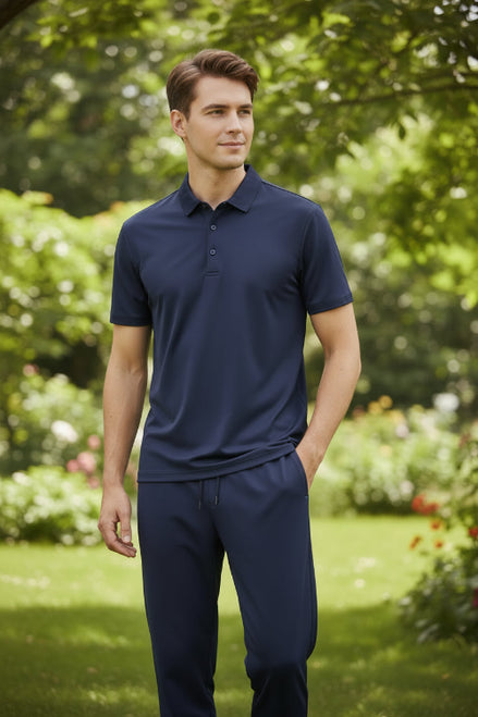 Navy blue polo shirt and pants set on a light gray surface with a blue gradient background.