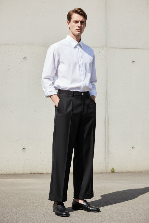 Black wide-leg pants on a white background