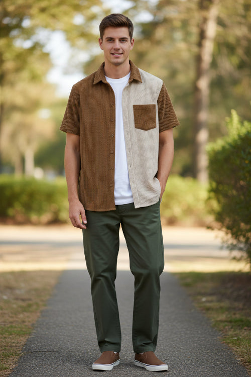 Brown and beige checkered shirt on a hanger against a white background