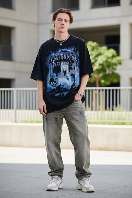 Person wearing a black t-shirt with graphic design and text