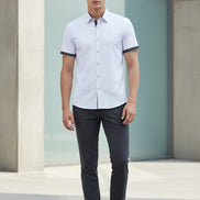 White short-sleeve shirt with black accents on a white background