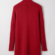 Red sweater dress on a hanger against a light gray background