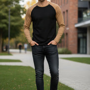 Black long-sleeve shirt with tan sleeves on a white background