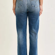 Back view of women’s Judy Blue straight-leg jeans showing rear patch pockets, belt loops, a waistband patch, and faded blue denim.⠋