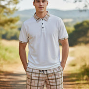 White polo shirt with plaid collar and matching shorts on a white background