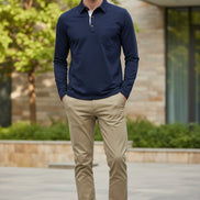 Navy long-sleeve polo shirt with a collar on a white background