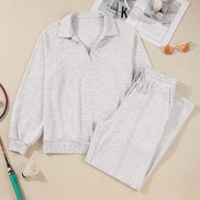 Gray pajama set with a tennis racket and shuttlecock on a beige background